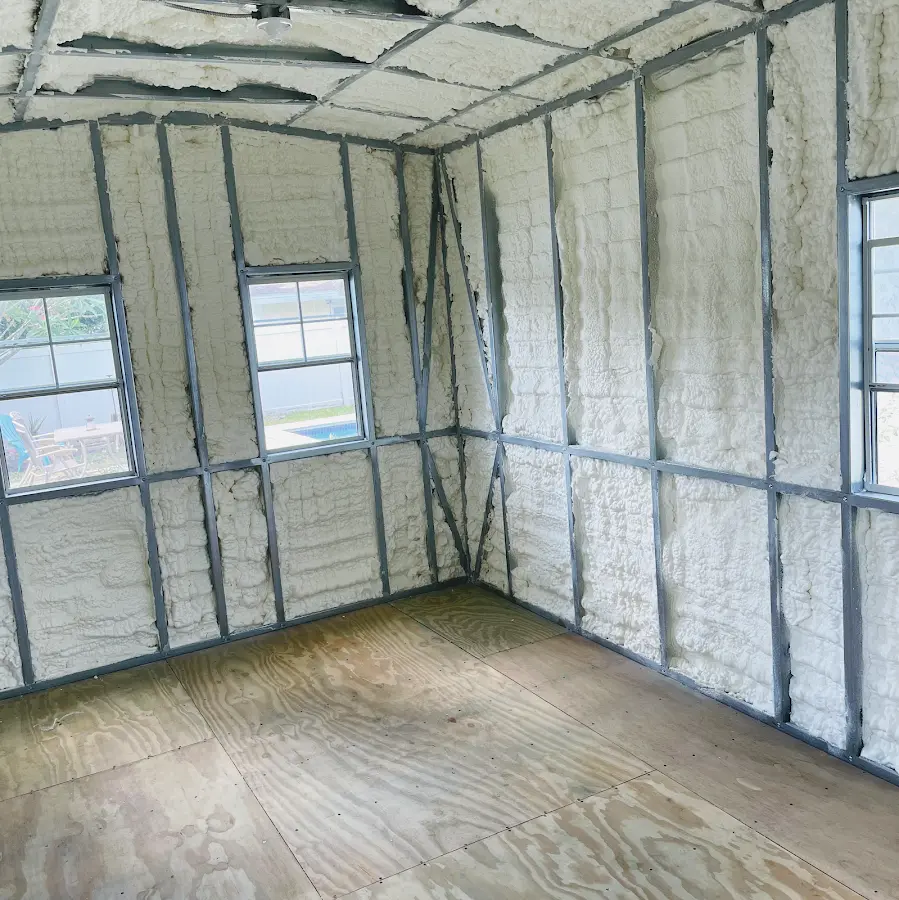 Closed-cell spray foam insulation applied to wall cavities in a residential project in Melvindale